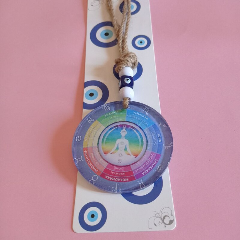 AMULETO PROTECCIÓN DE CUERDA Y BUDA CON 7 CHAKRAS EN VIDRIO CON OJO TURCO 23 X 8 CM