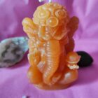 Figura de Vela Ganesha CANELA Y NARANJA Cera de Abeja Maciza. Larga duracion. Hecha a mano, Velón