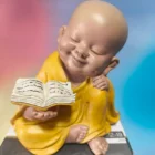 FIGURA BUDA NARANJA LIBRO