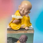 FIGURA BUDA NARANJA LIBRO