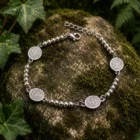 Pulsera de acero inoxidable con dijes de San Benito ajustable