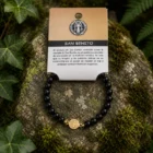 Pulsera elástica de Obsidiana Negra con dije dorado de San Benito en acero inoxidable