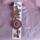 CHARM DE MADERA CON CAMPANA Y OJO TURCO 28 X 8 CM. Mano Hamsa Rosa