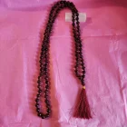 COLLAR JAPA MALA NUDADO DE 95 CM CON 108 CUENTAS DE OJO DE BUEY EN 8 MM Y BORLA DE 7 CM
